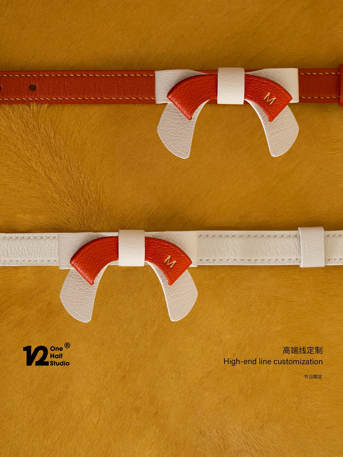 Red bow collar folded on a gold box